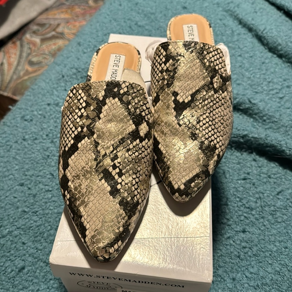 Steve Madden slides.  Snake print size 8.5